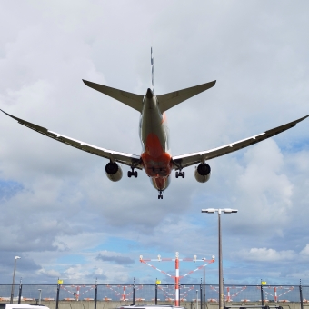 I Can Almost Touch It, Canal Airport Viewing Area, Tempe, with a plane landing low overhead in centre frame
