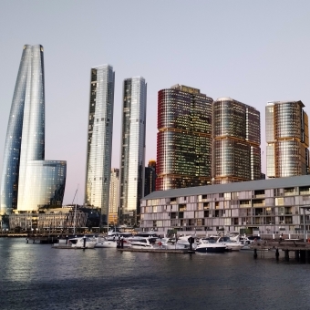 View of Barangaroo, Darling Island, Pyrmont, with the towering buildings of Barangaroo and the water below shedded in early evening sunlight