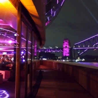 Reflections, Sydney Opera House, with the Sydney Harbour Bridge reflected in the glass of the Sydney Opera House two storeys up